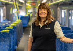 Image of Emma from Wellington Rail team on board a train