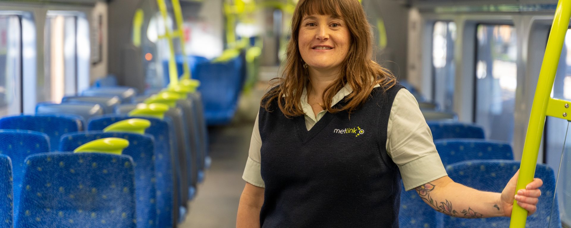 Image of Emma from Wellington Rail team on board a train